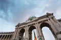 Brussels, Belgium. Famous triumphal arch - entrance to the Cinquantenaire park or Jubelpark. Royalty Free Stock Photo