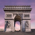 Arc de Triomphe of Paris against a pink sky