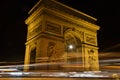 Arc de Triomphe in Paris, France - night view with traces of cars lights