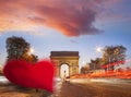 Arc de Triumph against red heart on Champs-Elysees street, Happy Valentine`s Day, Paris in love, France Royalty Free Stock Photo
