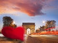 Arc de Triumph against red heart on Champs-Elysees street, Happy Valentine`s Day, Paris in love, France