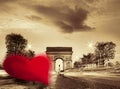 Arc de Triumph against red heart on Champs-Elysees street, Happy Valentine`s Day, Paris in love, France Royalty Free Stock Photo