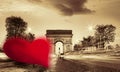 Arc de Triumph against red heart on Champs-Elysees street, Happy Valentine`s Day, Paris in love, France Royalty Free Stock Photo