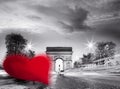 Arc de Triumph against red heart on Champs-Elysees street, Happy Valentine`s Day, Paris in love, France