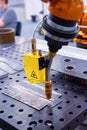 Arc welding robot. Example of working with a laser pointer Royalty Free Stock Photo