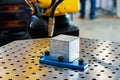 Arc welding robot. Example of working with a laser pointer Royalty Free Stock Photo