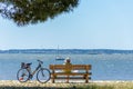 Arcachon Bay, France, woman on a public bench