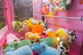 Close up to toys machine at shopping mall. Arcade claw machine toys crane game Royalty Free Stock Photo