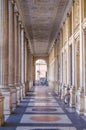 arcade with columns and reliefs on ceiling in city center of rome...IMAGE