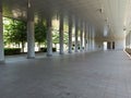 The arcade full of columns in Perspective in a modern building in Bologna fair district Italy