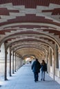 Arcade at the Place des Vosges in Paris - France Royalty Free Stock Photo