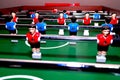 Arcade table soccer with tools for playing for office and home games Royalty Free Stock Photo