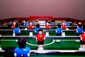 Arcade table soccer with tools for playing for office and home games Royalty Free Stock Photo