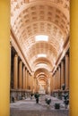 BOLOGNA - ITALY, APRIL 16, 2017. Arcade with tombs and monument inside the Monumental Cemetery of Certosa di Bologna