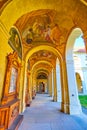 The arcaded corridor of the cloister with scenic frescoes on ceilings, Loreta of Prague, Czechia