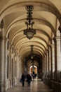 The arcades surround the PraÃÂ§a do ComÃÂ©rcio in Lisbon