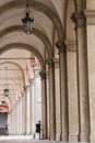 Arcades under the buildings, porticoes along the building, typical Bologna architecture