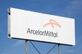 ArcelorMittal logo on a panel