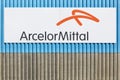 ArcelorMittal logo on a wall