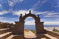 Arch above titicaca lake in peru Royalty Free Stock Photo