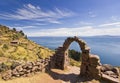 Arch above titicaca lake in peru Royalty Free Stock Photo
