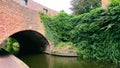 Arch brick bridge over canal Royalty Free Stock Photo