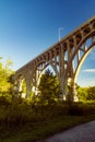 Arch bridge spanning a river in Cuyahoga Valley National Park Royalty Free Stock Photo