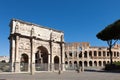 The Arch of Constantine Arco di Costantino. .Triumphal arch and Colosseum on background. Rome Royalty Free Stock Photo