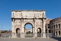 The Arch of Constantine Arco di Costantino. .Triumphal arch and Colosseum on background. Rome, Royalty Free Stock Photo