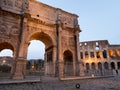 The Arch of Constantine and the Colosseum in Rome, Italy Royalty Free Stock Photo