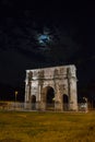 arch of constantine of the roman forum viewed at night near the colosseum in rome, Italy Royalty Free Stock Photo