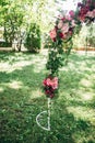 Arch decorated purple and red flowers