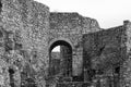 Arch Doorway and Crumbling Stone Ruins of Castle