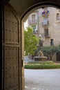Arch doorway with view of courtyard in Solsona, Cataluna, Spain