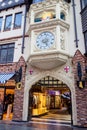 The arch entrance to London Court shopping passage and clock above