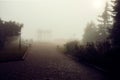 Arch of Friends in Poltava, Ukraine deem image in the fog. Text says