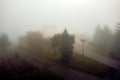 Arch of Friends in Poltava, Ukraine deem image in the fog. Text says