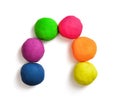 Arch made with colorful balls of modelling clay on white background Royalty Free Stock Photo