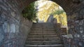 Arch in a medieval castle. Stone wall. Royalty Free Stock Photo