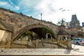 Arch of the old Charles Bridge in Prague above the devil river channel ertovka