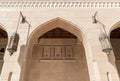 Arch with oriental lantern of the Sultan Qaboos Grand Mosque, Oman Royalty Free Stock Photo
