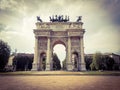 Low angle view of historical building Arch of Peace of Gate Sempione an ancient entrance of the city of Milan in Italy. Royalty Free Stock Photo