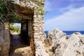 Arch of a private property on the paved path along the coast Juan-les-Pins in Antibes France Royalty Free Stock Photo