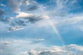 Arch rainbow natural phenomenon with clouds in sky Royalty Free Stock Photo