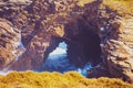 Arch in the rock. Beach Playa de Augas Santas