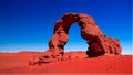 Arch Rock formation aka Arch of Africa or Arch of Algeria with moon at Tamezguida in Tassili nAjjer in Algeria Royalty Free Stock Photo