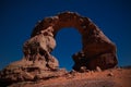 Arch Rock formation aka Arch of Africa or Arch of Algeria with moon in Tassili nAjjer national park in Algeria