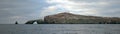 Arch Rock and Lighthouse of Anacapa Island of the Channel Islands National Park off the gold coast of California United States Royalty Free Stock Photo