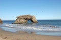 Arch in the sea at Natural Bridges State Beach, Santa Cruz, California Royalty Free Stock Photo