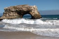 Arch in the sea at Natural Bridges State Beach, Santa Cruz, California Royalty Free Stock Photo